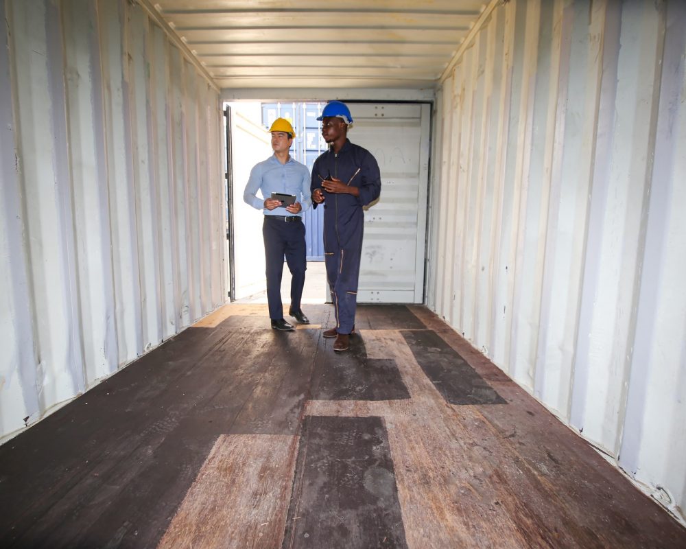 Foreman control Industrial Container Cargo freight ship at industry.